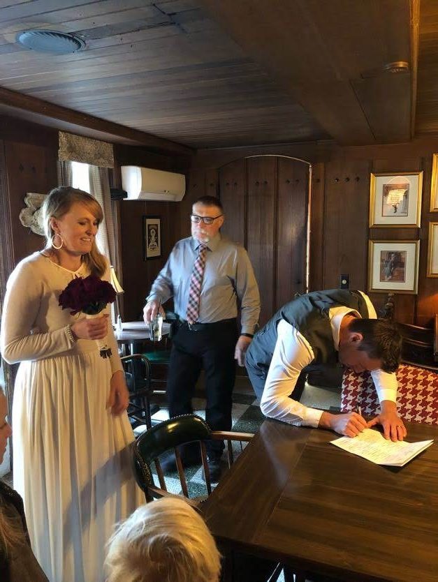 Signing the marriage license