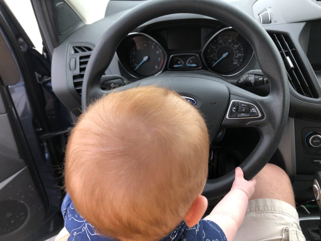 Riley driving.