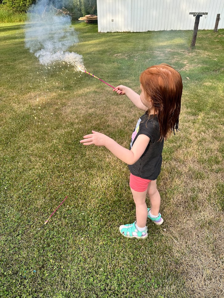 Riley with a sparkler.
