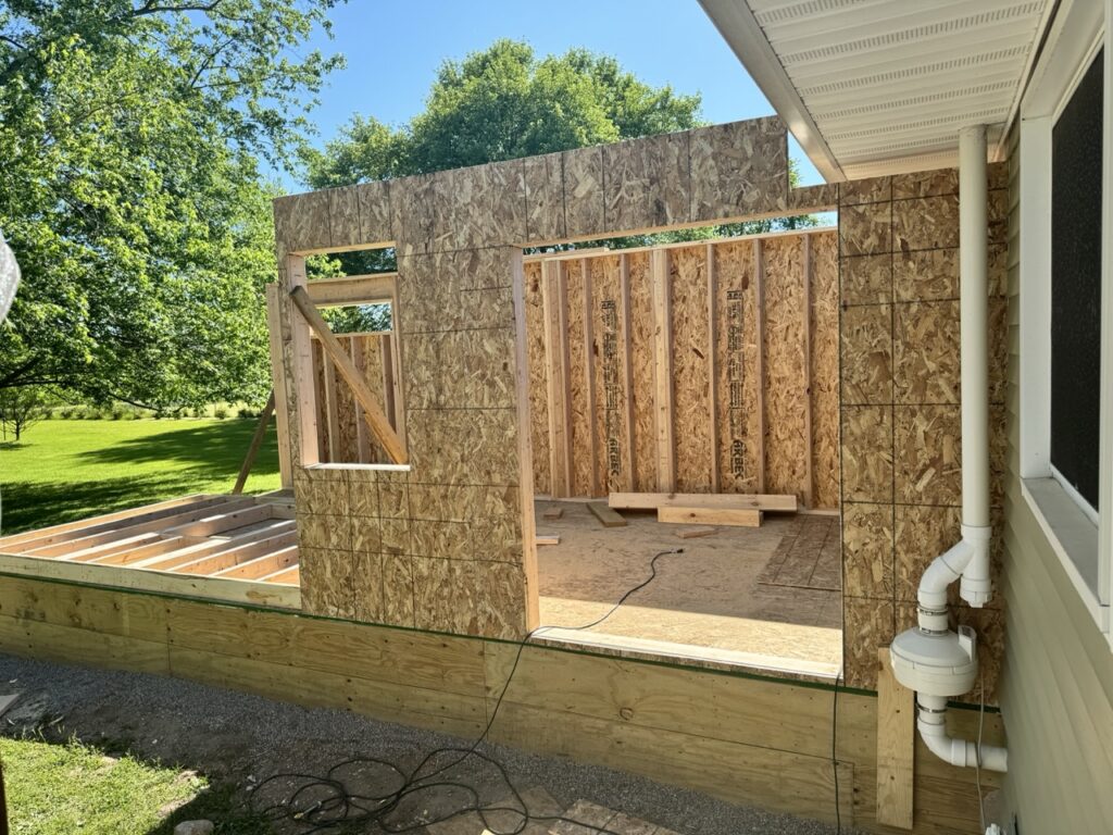 Exterior walls around existing roof.