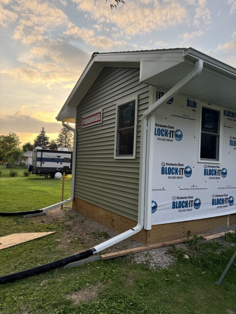 south side of the addition with siding