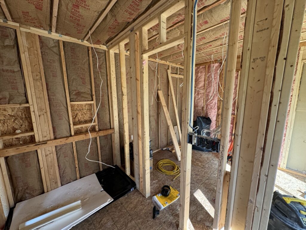 Interior shot showing the shower and walk-in closet area.