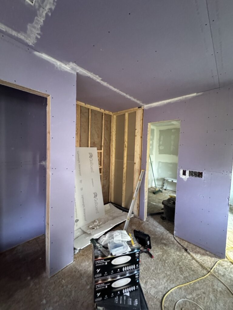 shot of the shower and walk-in closet area.