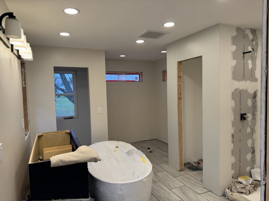 Photo of the bathroom painted with lights.