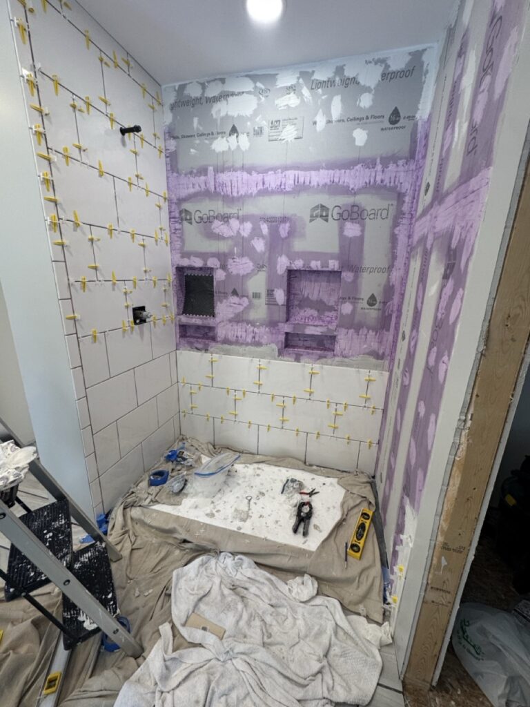 More shower tile going on
