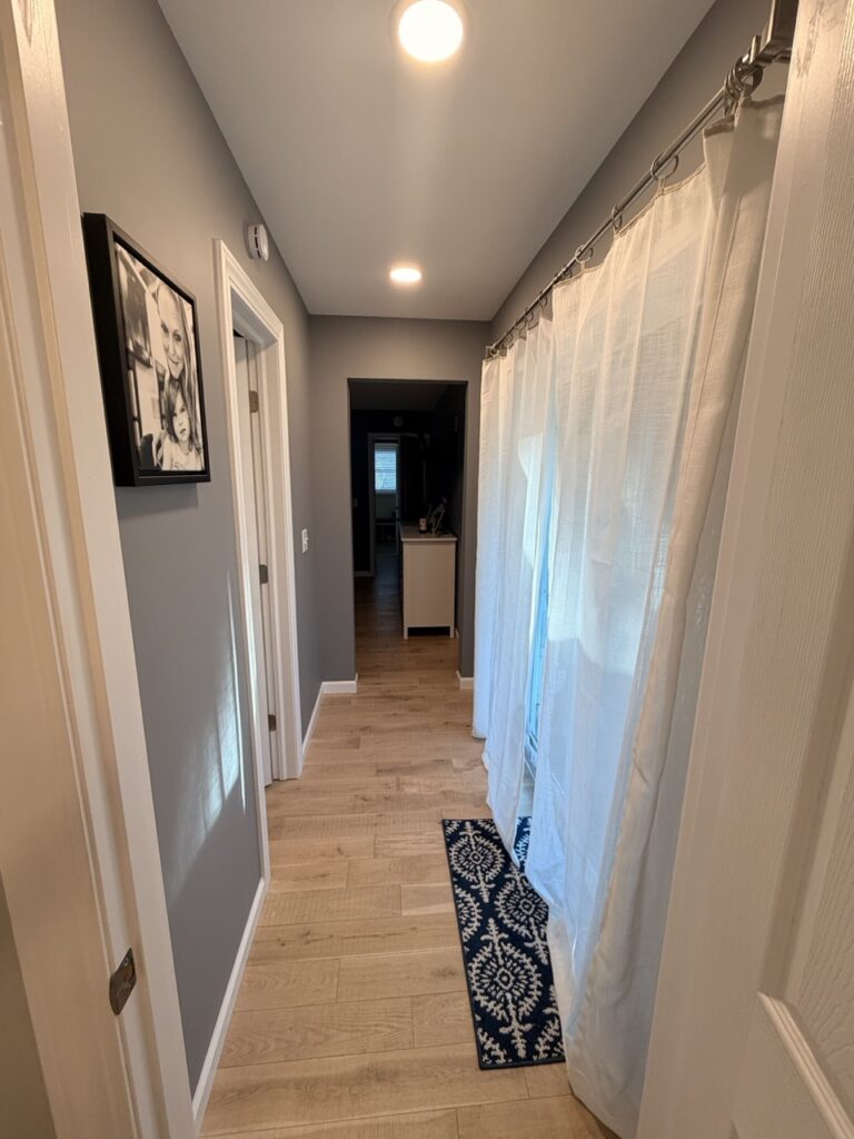 Look from the hall back into the existing house.